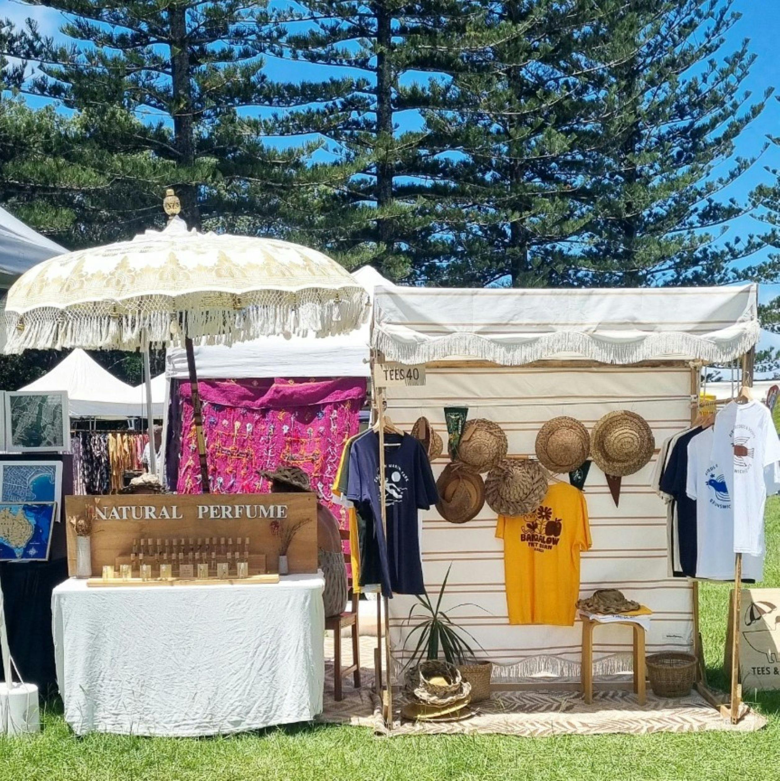 A hat stall with other items for sale like jewellery