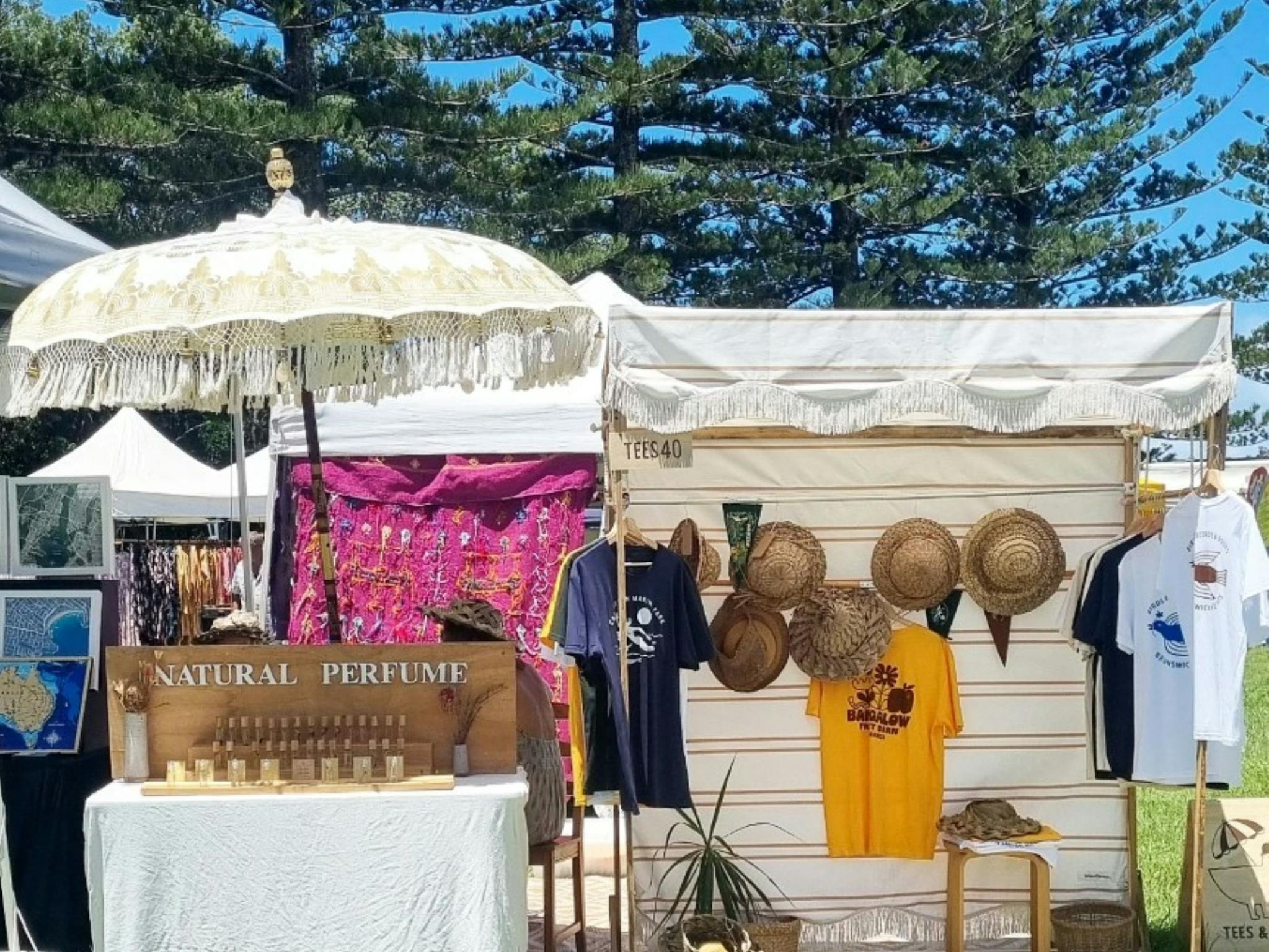 A hat stall with other items for sale like jewellery