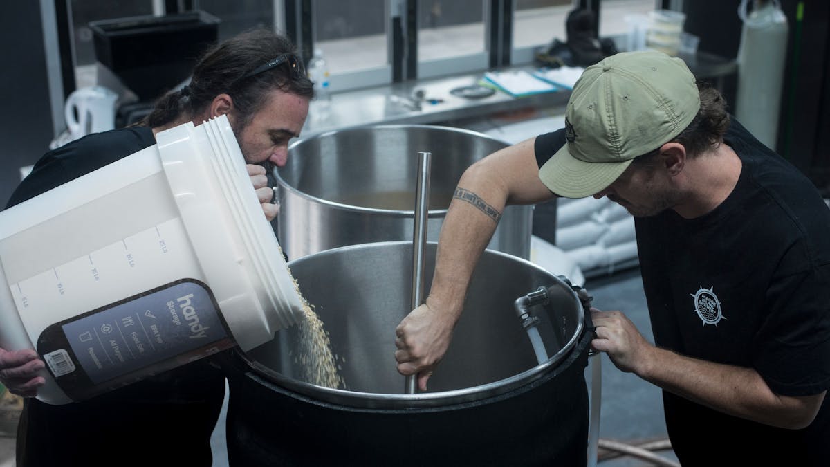 The head and assistant brewers passionately crafting beer in the brewery
