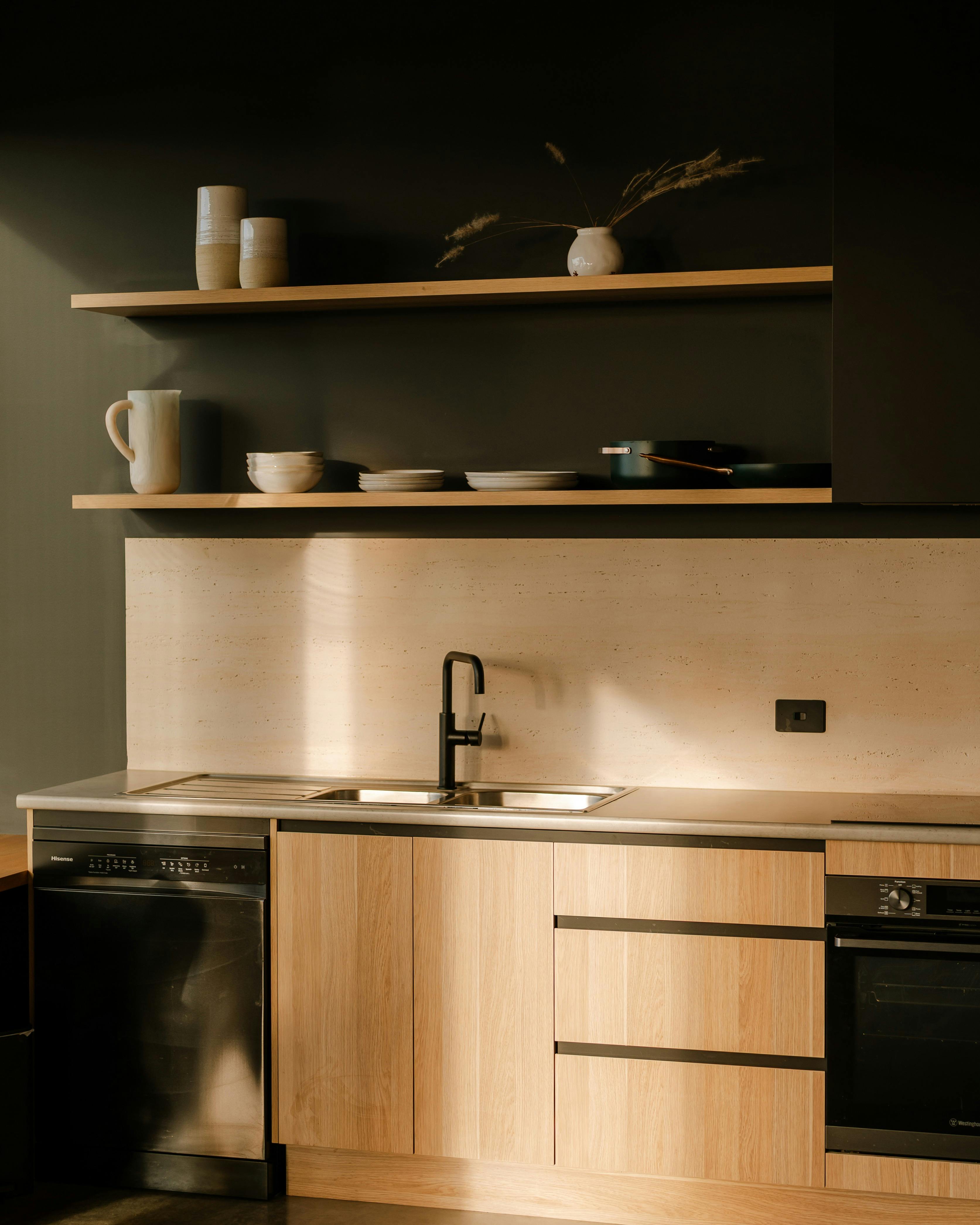 Dishwasher Sink and Cabinetry in full kitchen image
