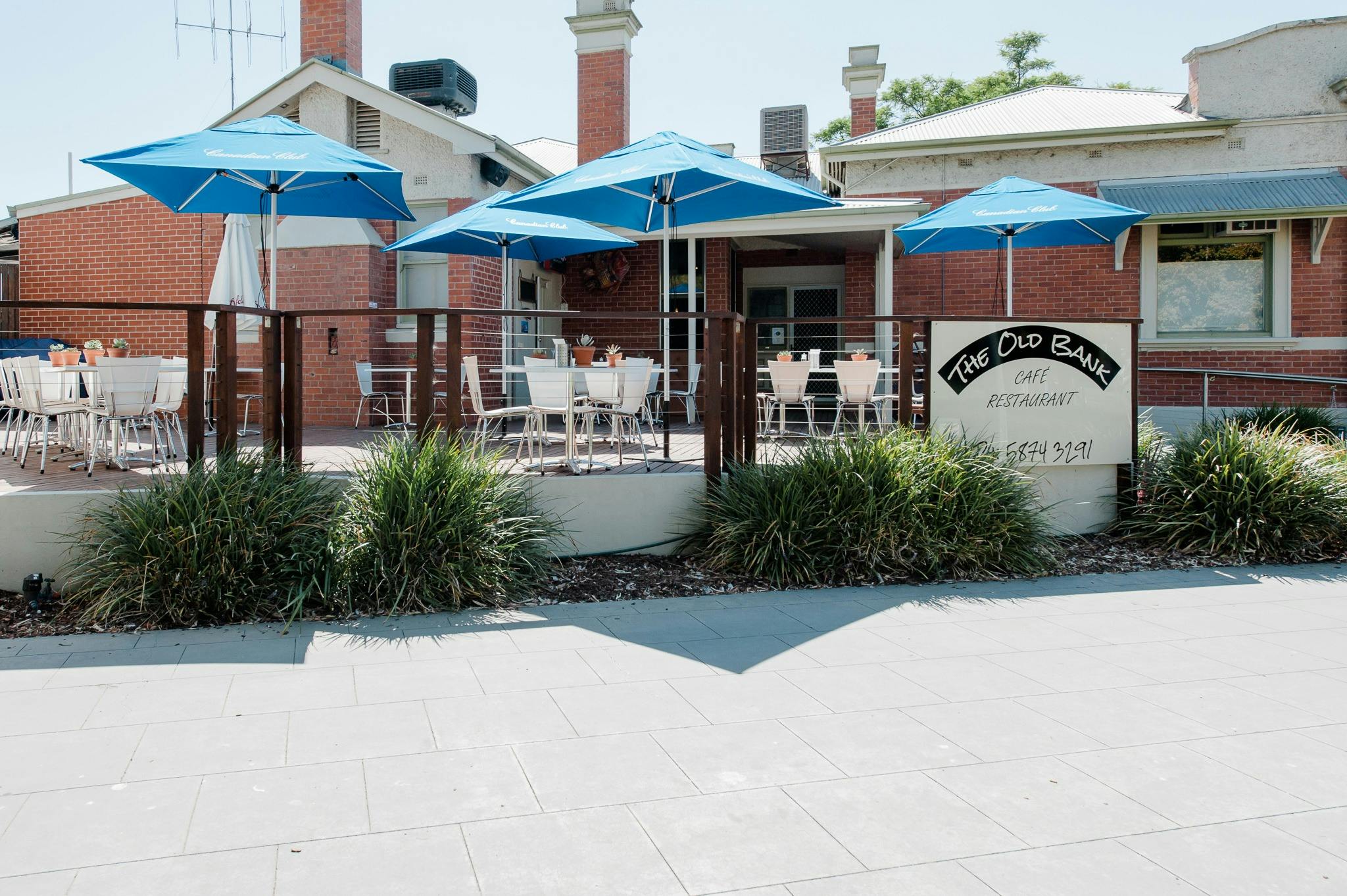 Outdoor dining at The Old Bank Tocumwal in a restored historic bank building.