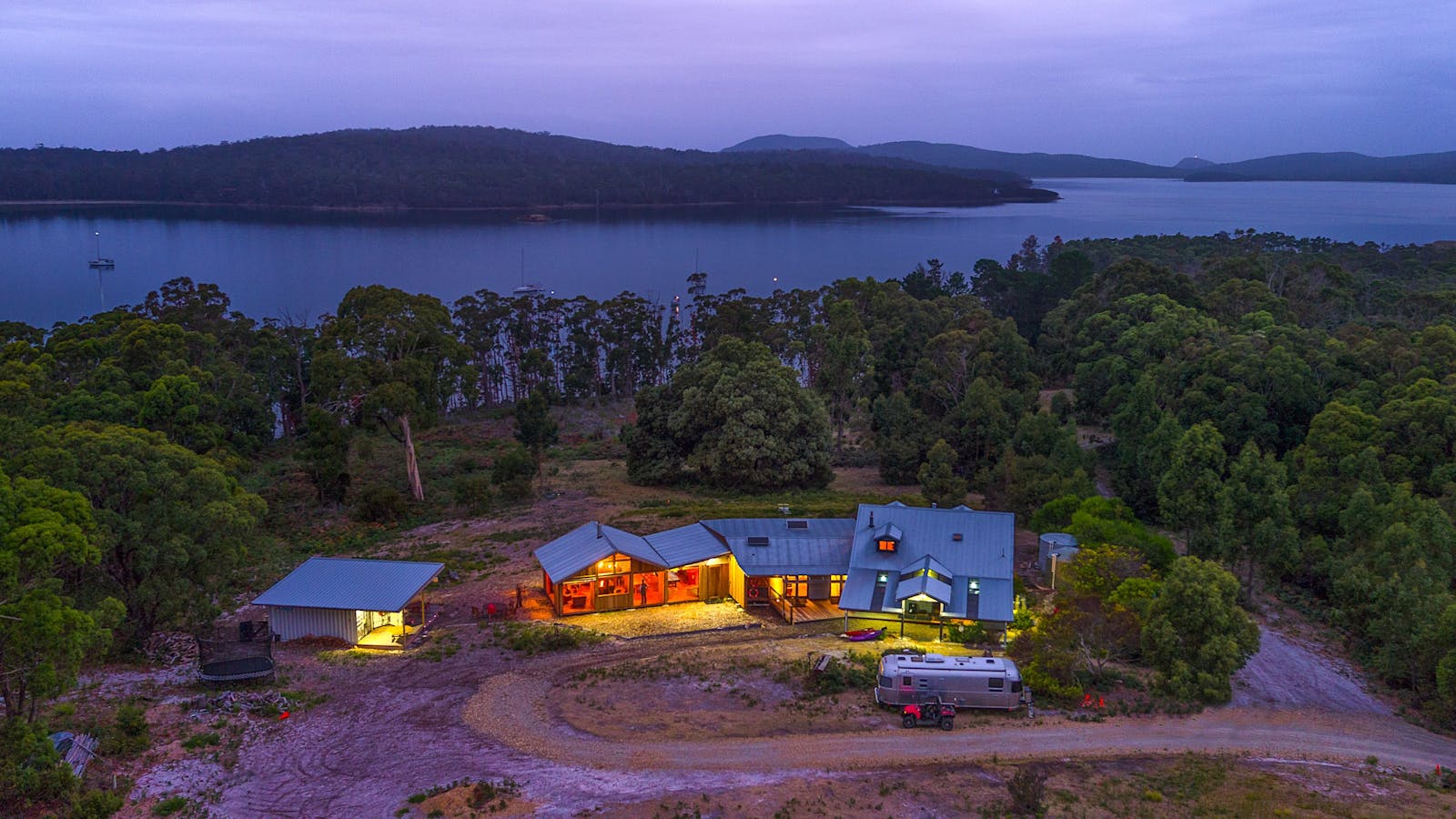 Bruny Island Lodge aerial evening view to Mickeys Bay