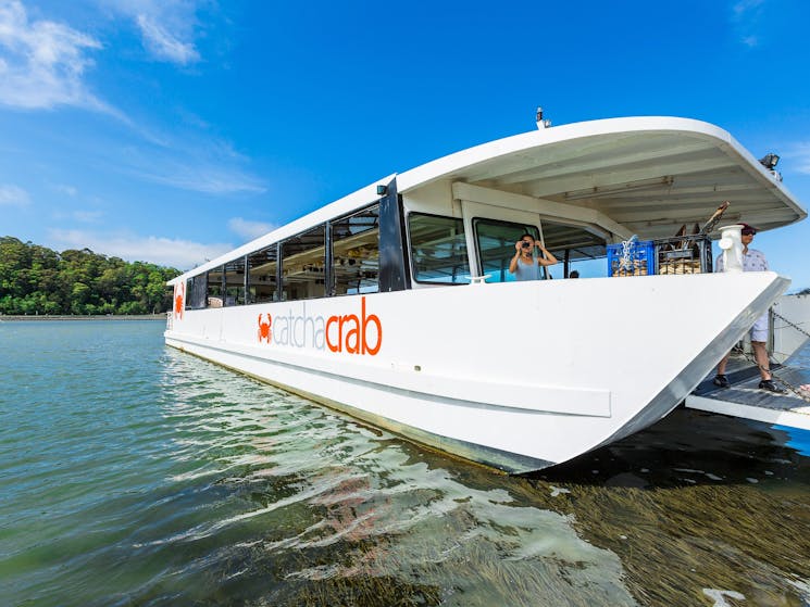 Our river-cruising boat, custom-designed for the waters of the Tweed River
