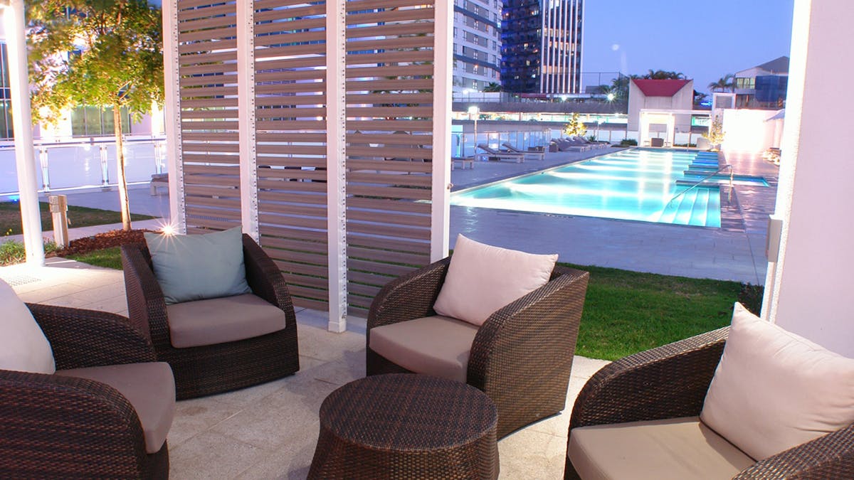 Relax by the pool at The H Residences