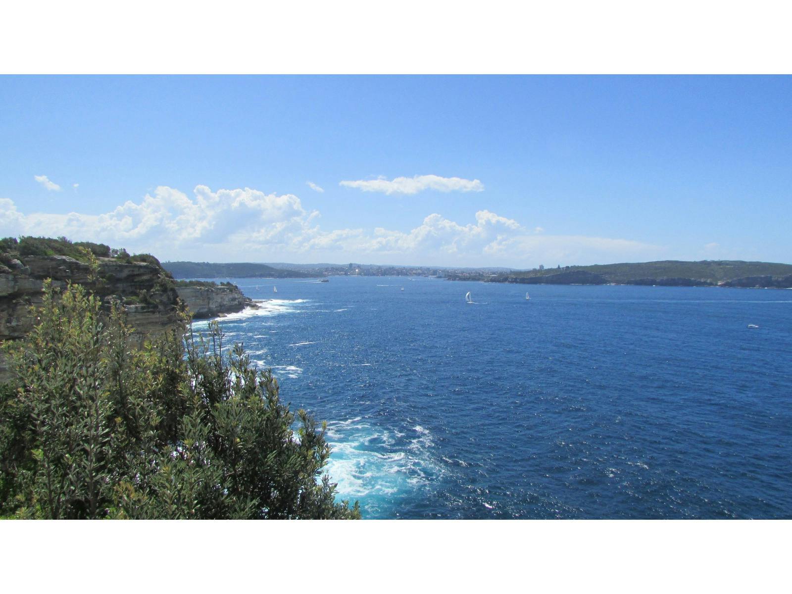 Tour guide leads you on a sandy walking adventure to some scenic sites such as Macquaries Lighthouse