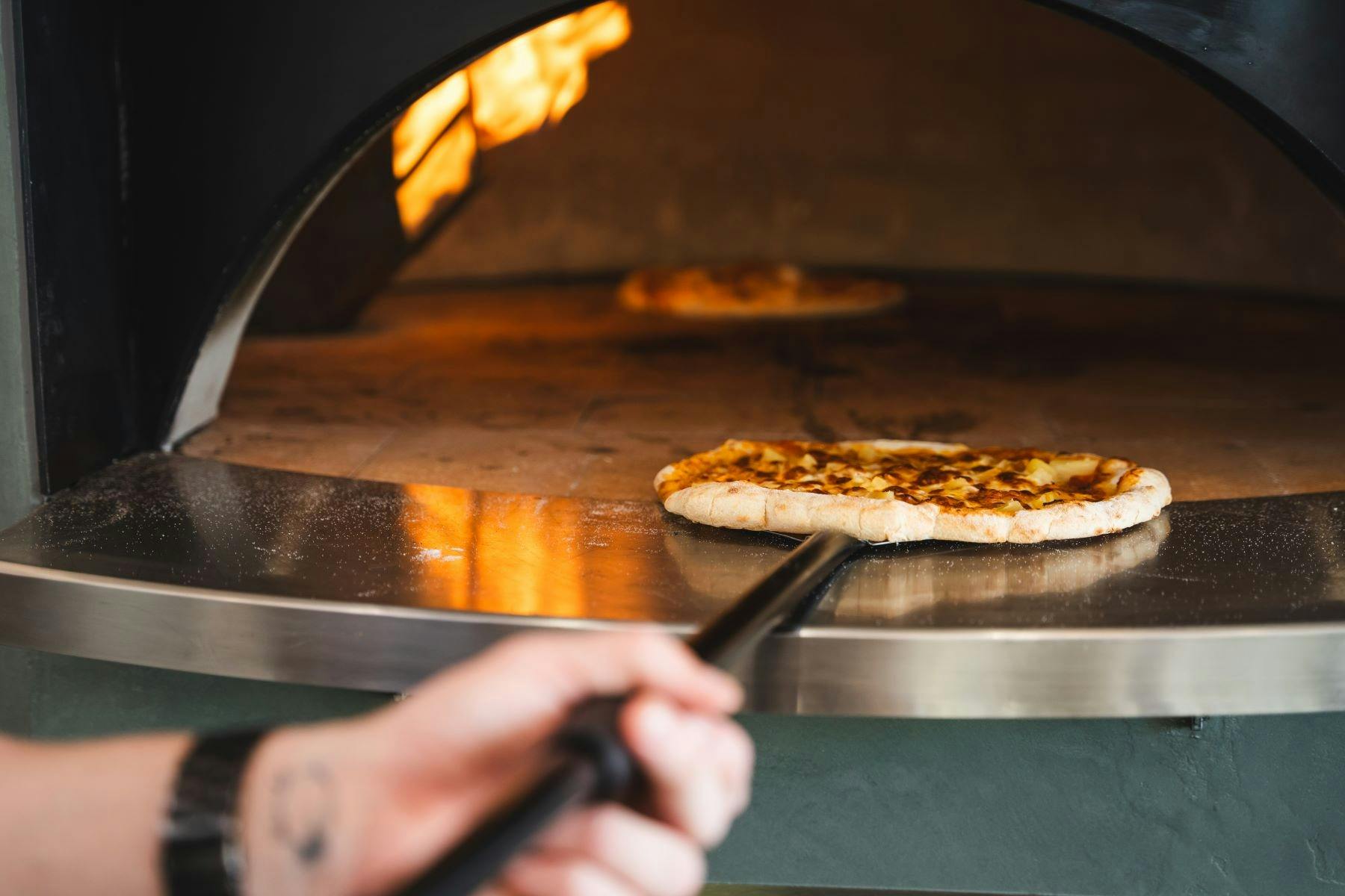 Stone-baked pizza from Flick's Tucker menu
