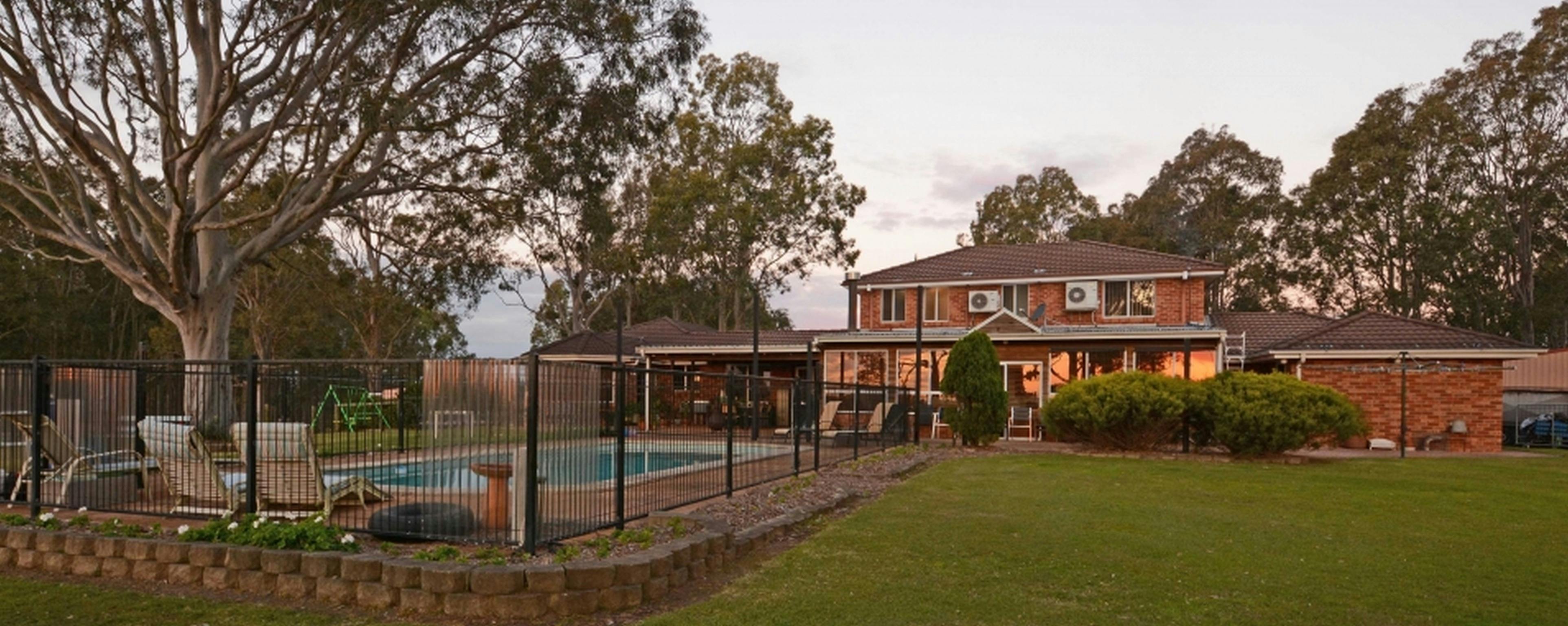 Backyard and swimming pool at Bella Wind Bed and Breakfast