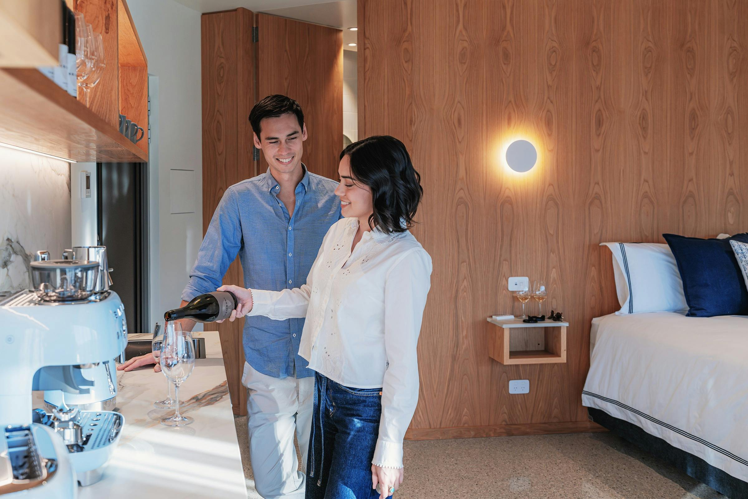 Woman pouring wine in a glass