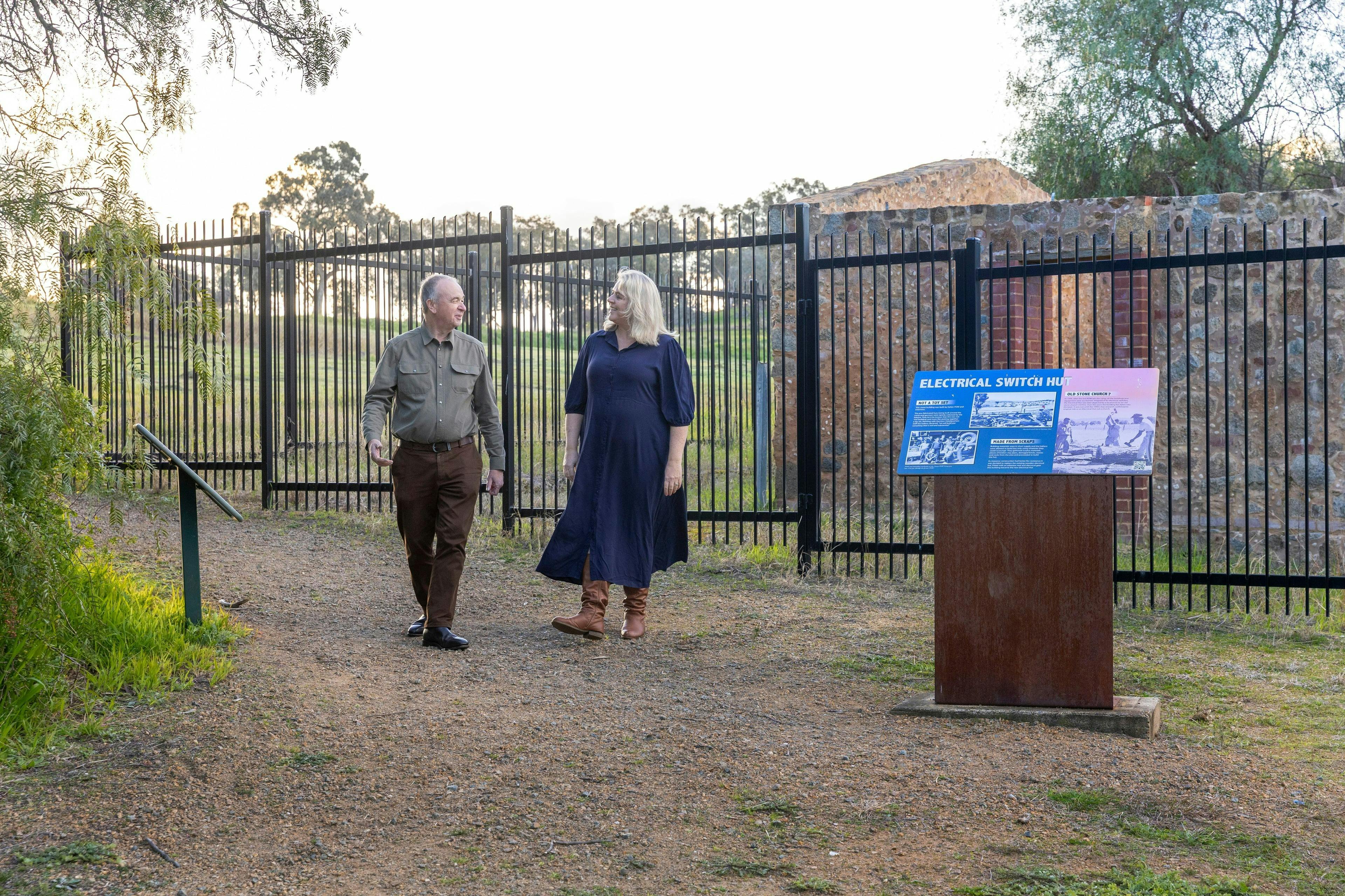 Two Eucalypt Tours guides walking through the historic Cowra Prisoner of War Camp site.