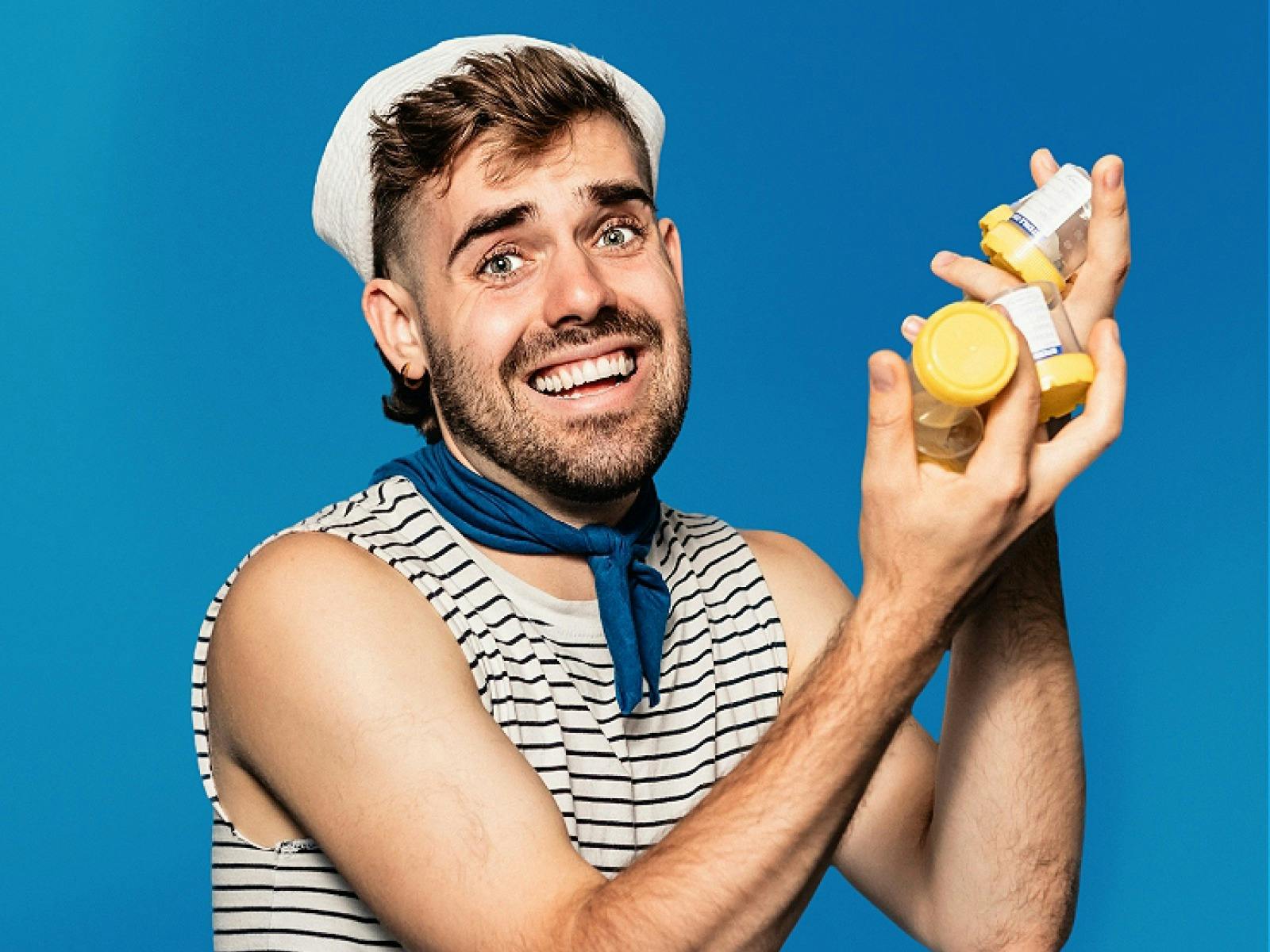 Portrait of artist with medicine bottles, dressed in a sailors outfit