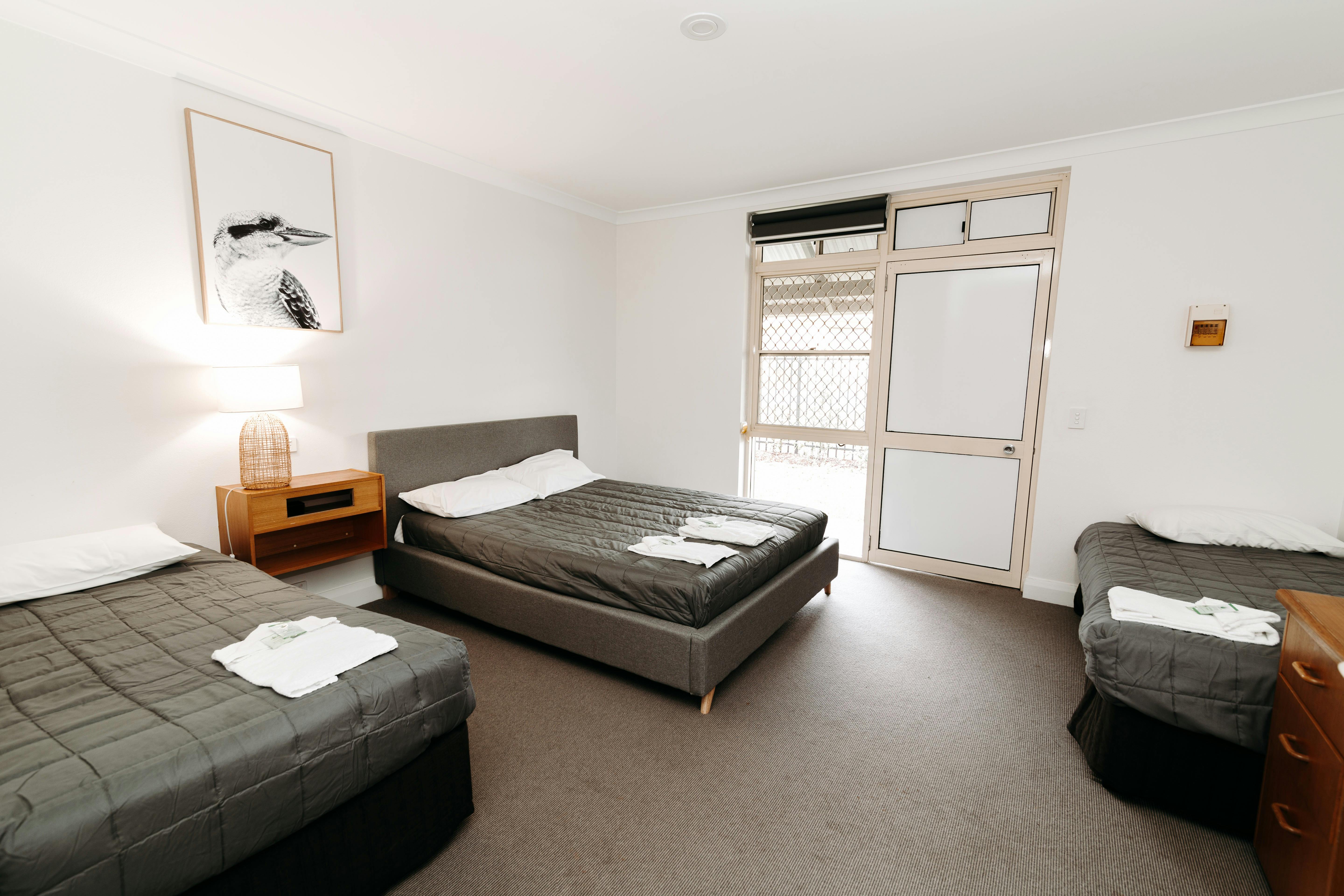 Hotel Room with one single and one double bed