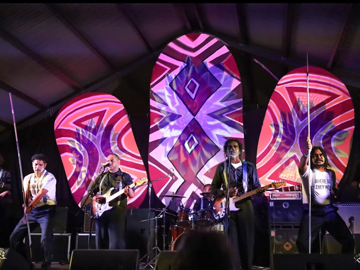 A band plays at Kuranda Roots Festival at Emerald Creek near Mareeba, FNQ.