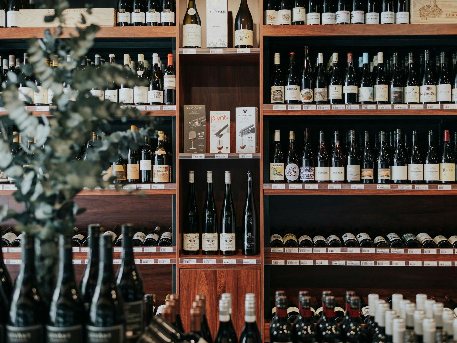 Inside The Heritage Wine Store & Bottle Shop are shelves of wines, spirits & other options