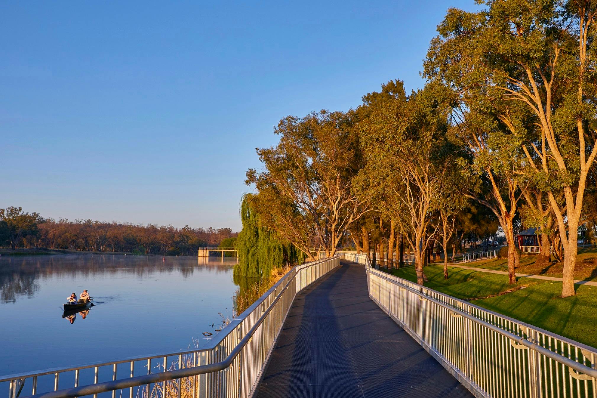Boardwalk on right and Lake Inverell with Kayaker on left