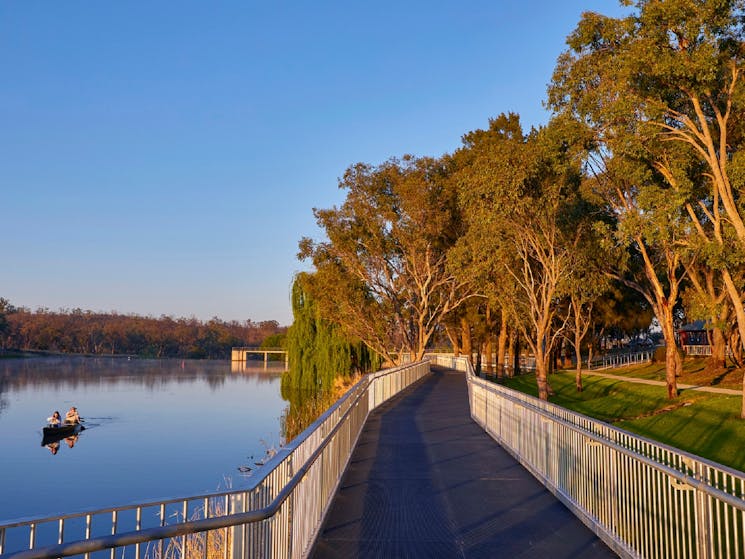 Boardwalk on right and Lake Inverell with Kayaker on left