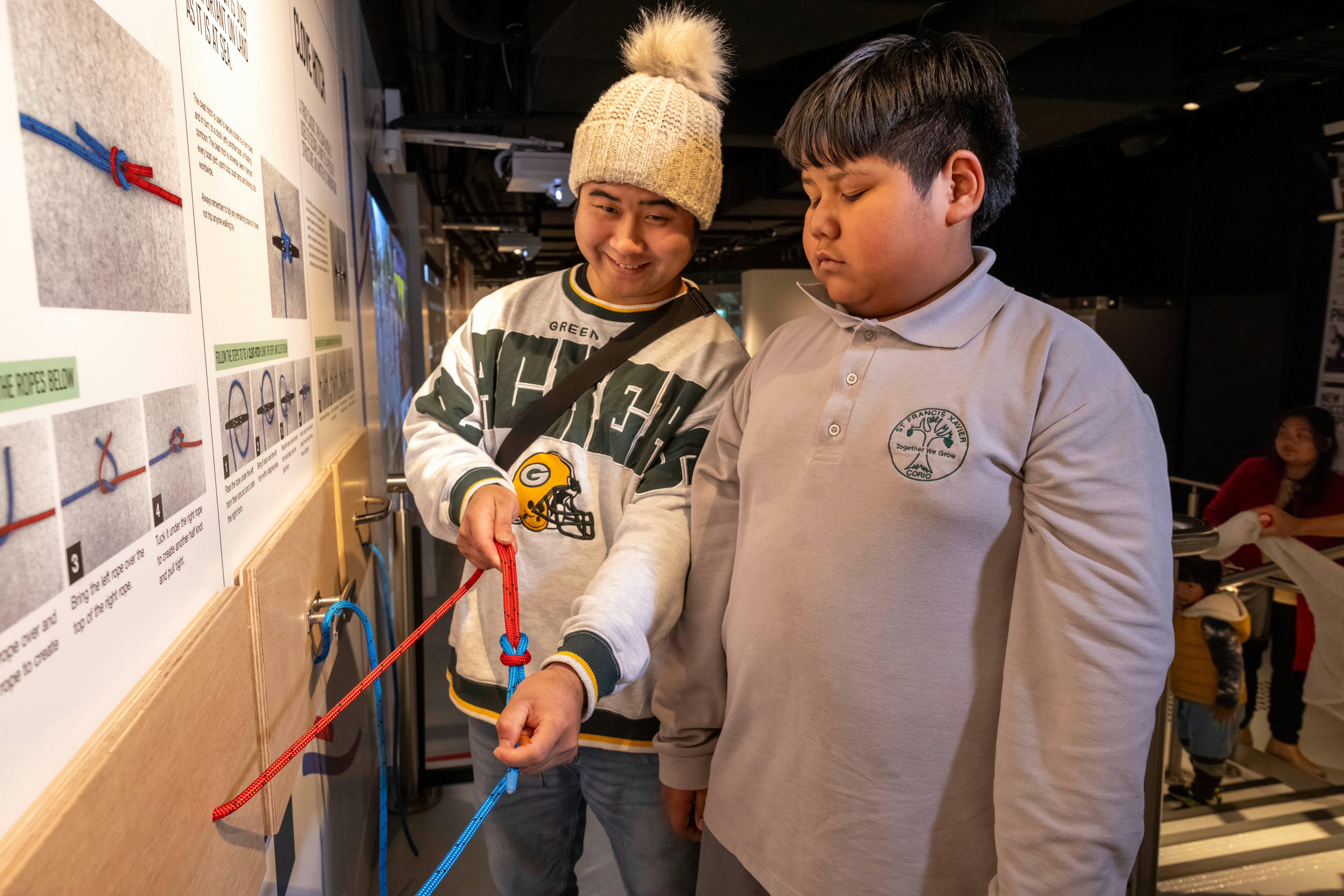 Family using Sailing Knots wall