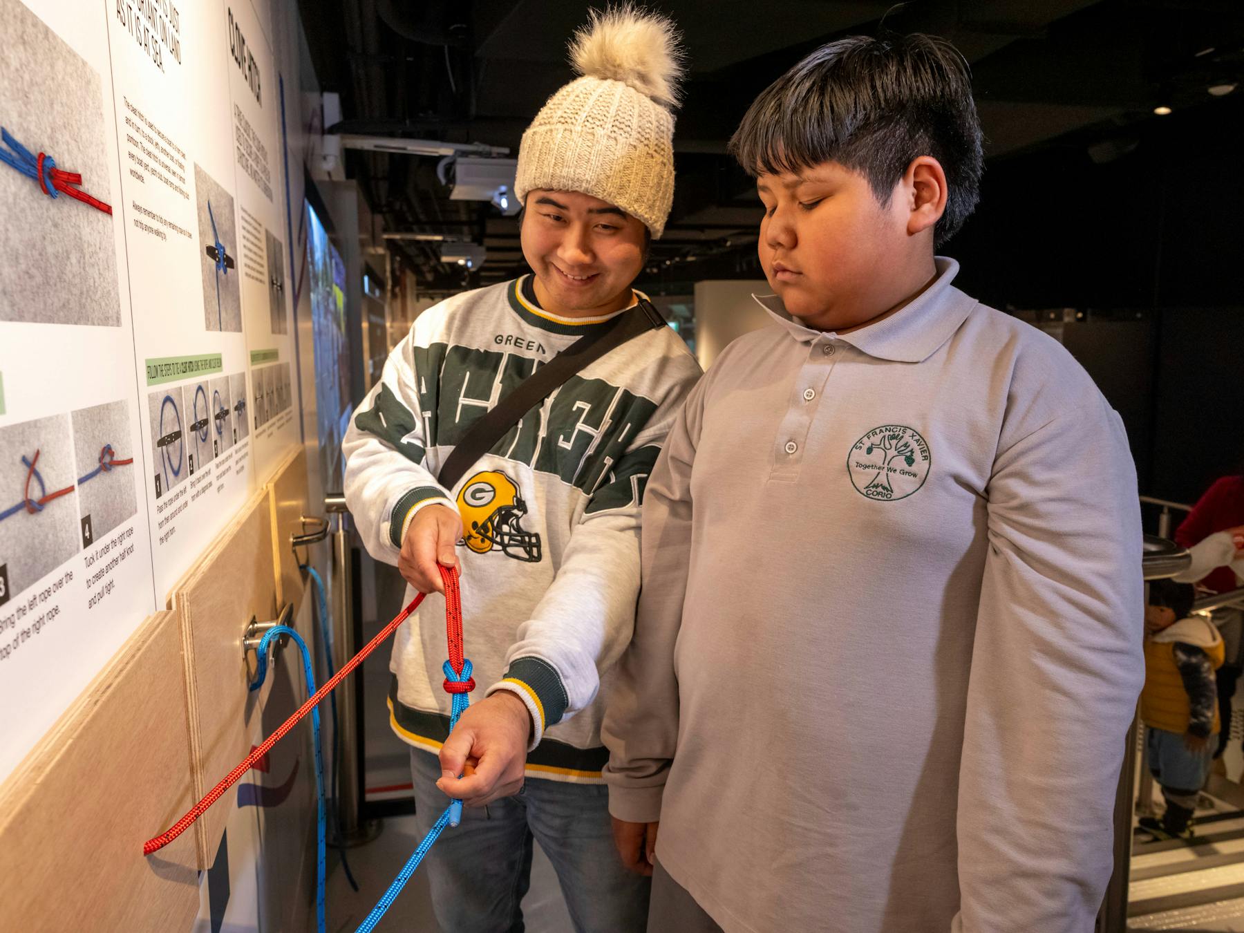 Family using Sailing Knots wall