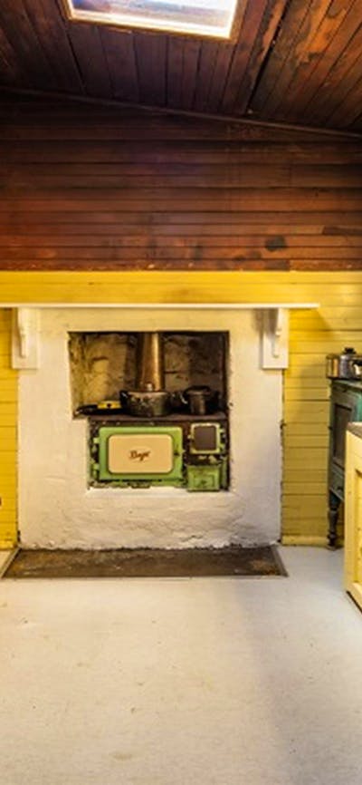 Daffodil Cottage kitchen, Kosciuszko National Park. Photo: Murray Vanderveer/OEH