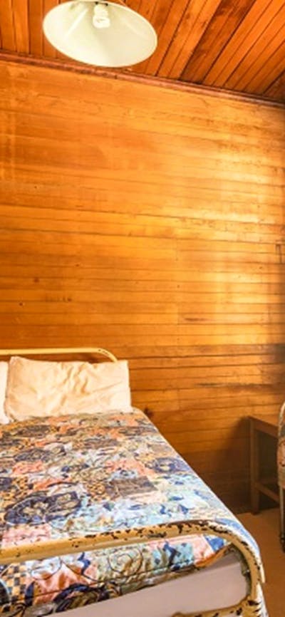 One of the bedrooms in Daffodil Cottage, Kosciuszko National Park. Photo: Murray Vanderveer/OEH