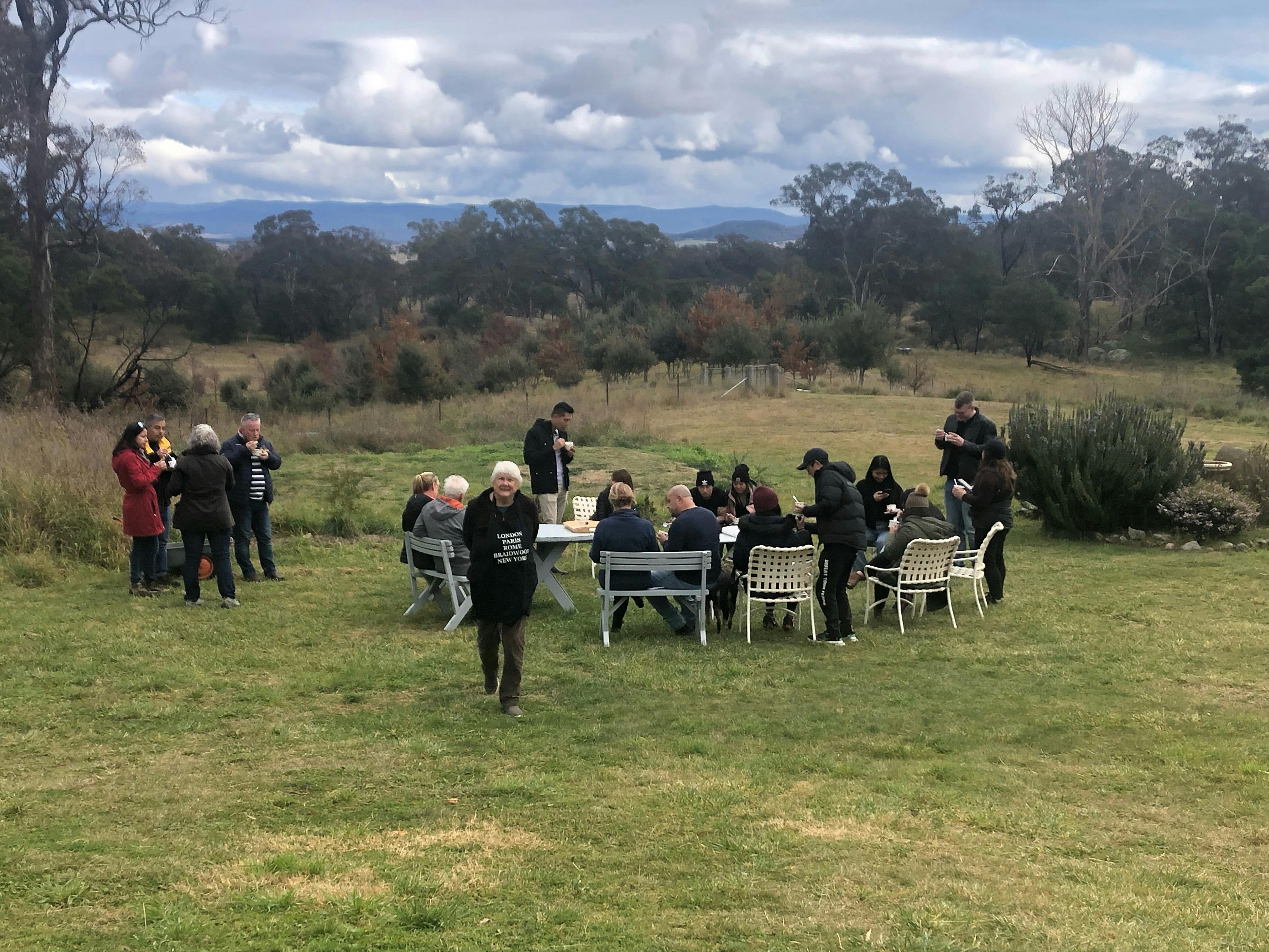 Tasting truffle around outdoor fire pit