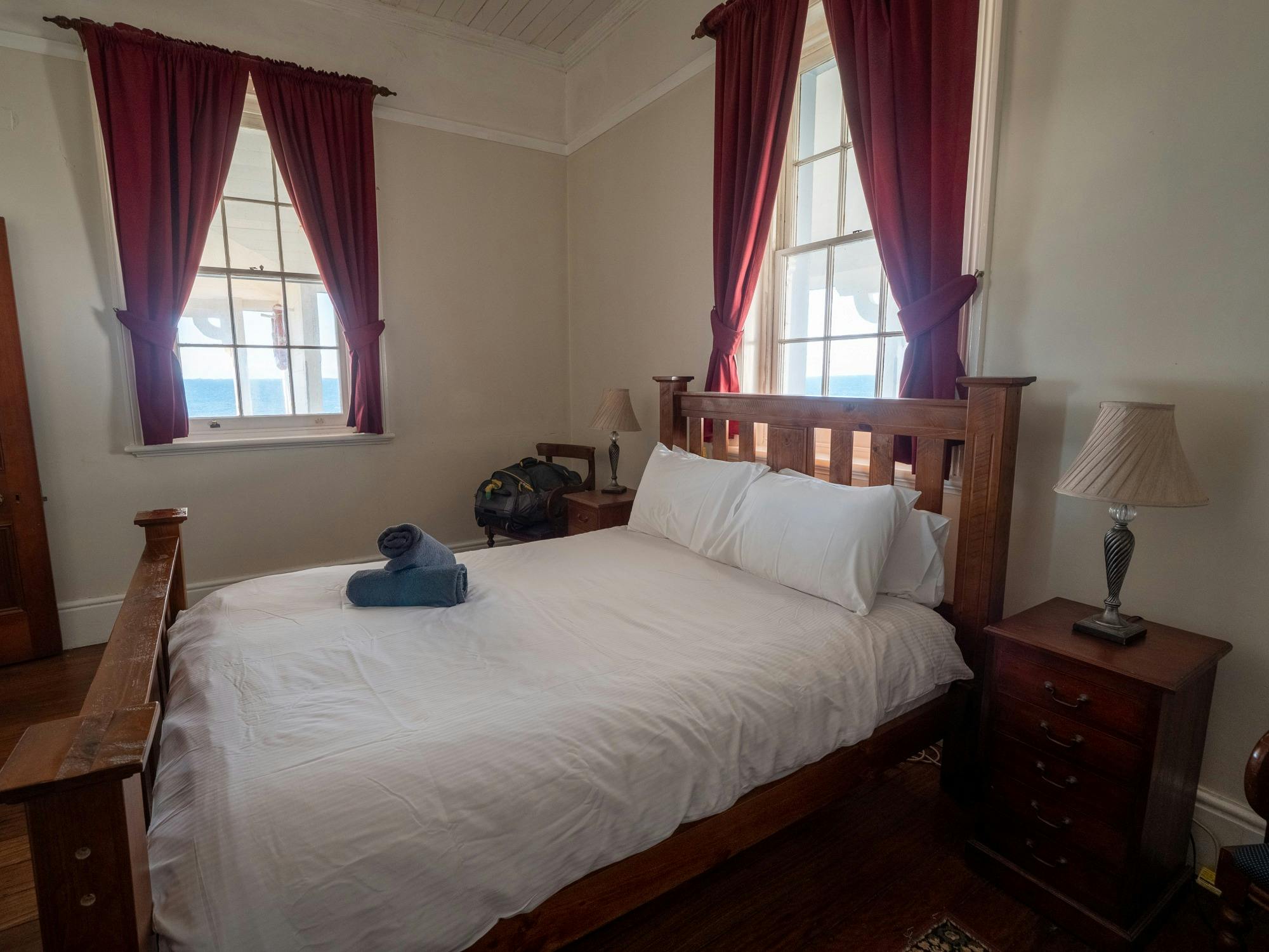 Guest room with queen bed and ocean views