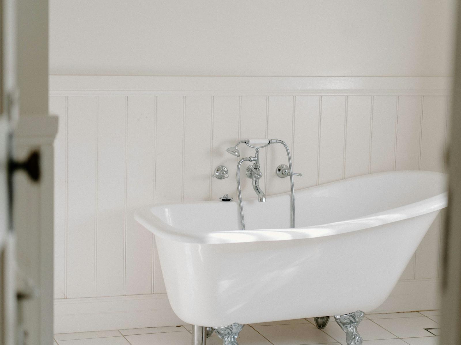 Large bathroom featuring claw foot bath tub