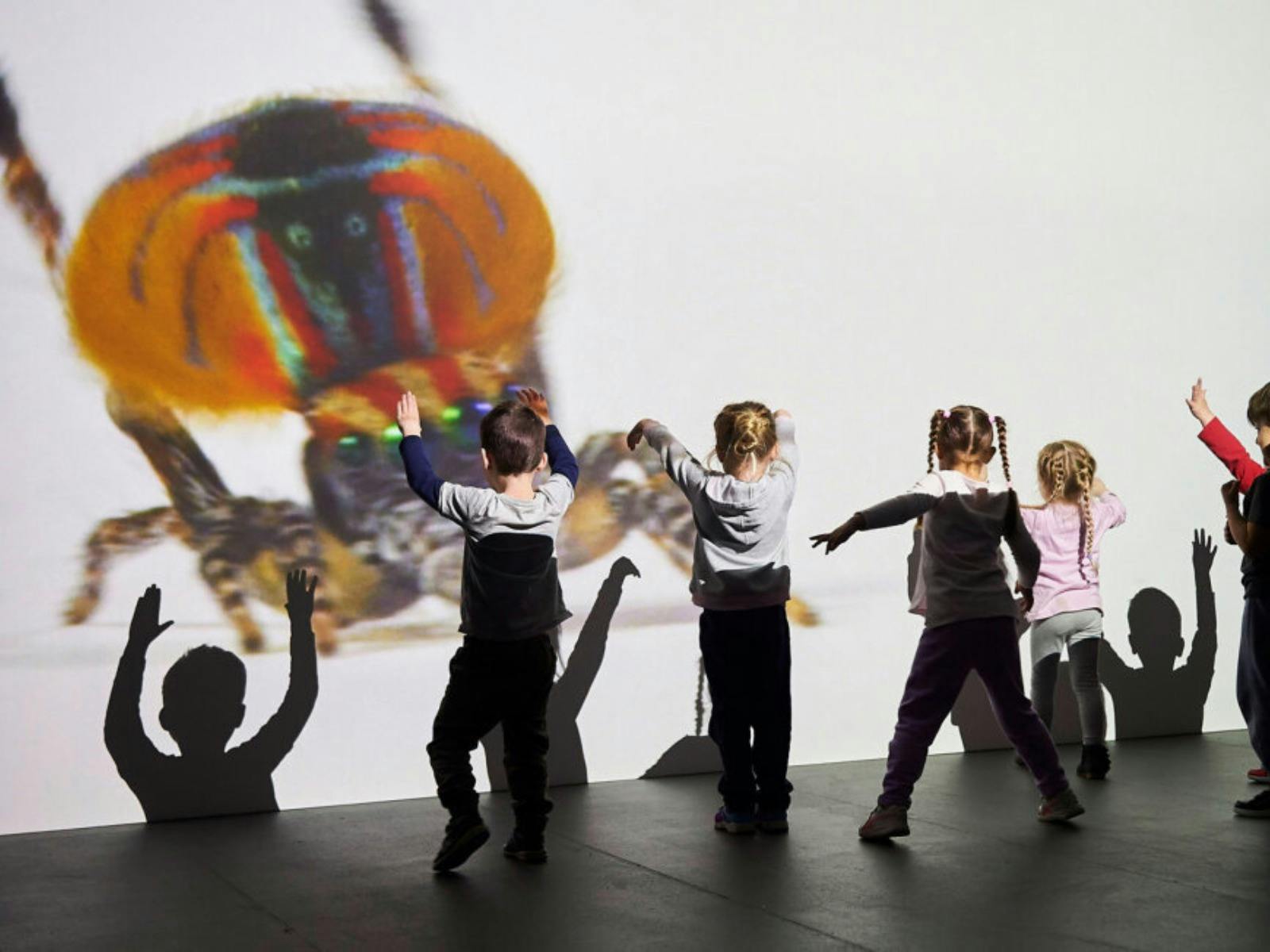 kids interact with digital artwork