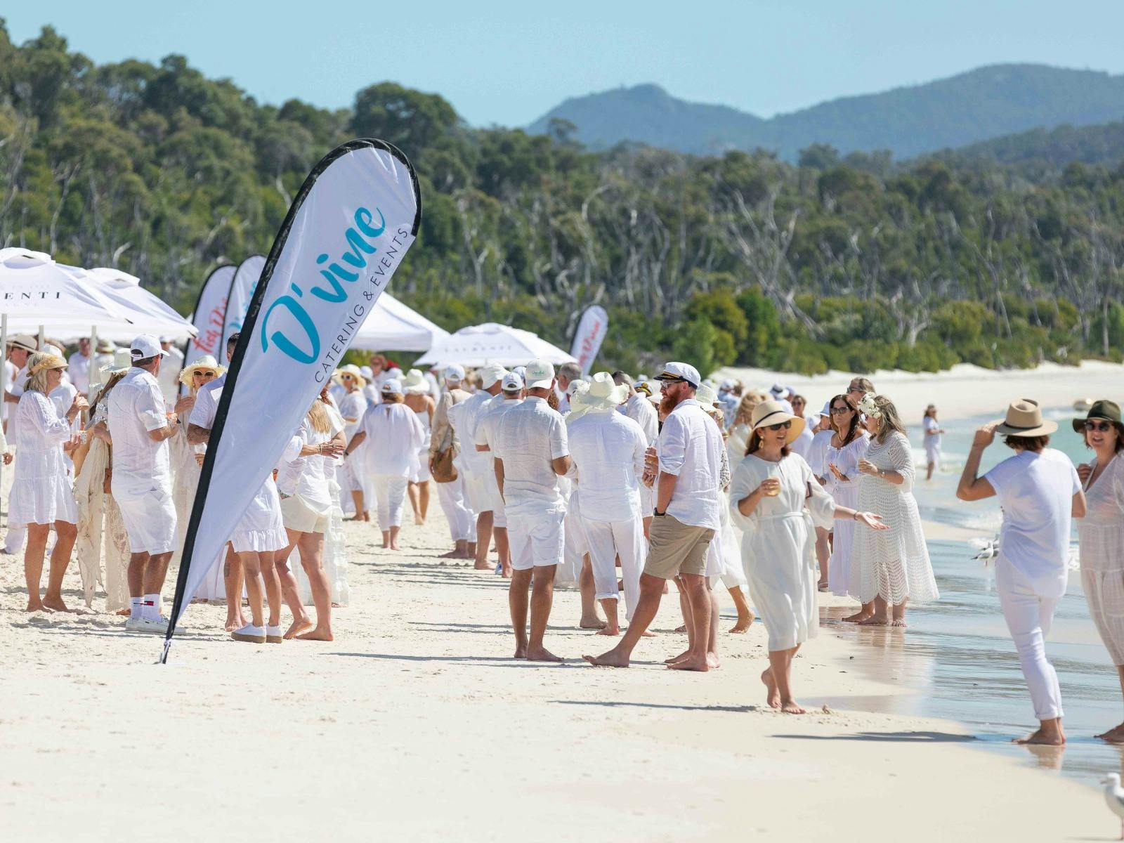Relaxing on Whitehaven Beach after White on Whitehaven Long Lunch