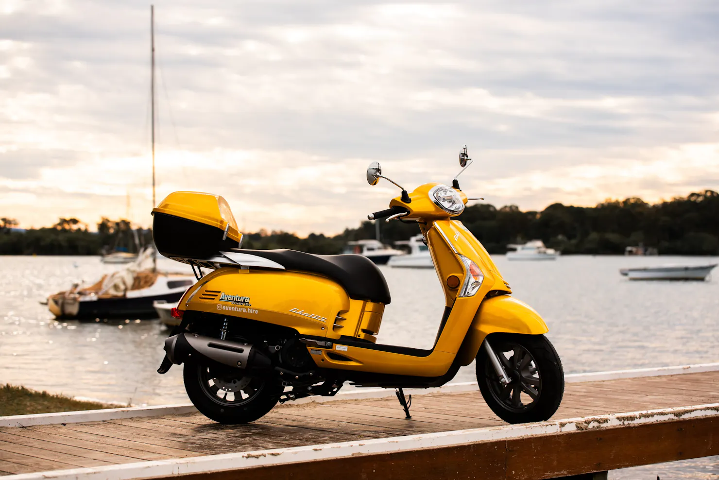 Yellow scooter on jetty in Noosa