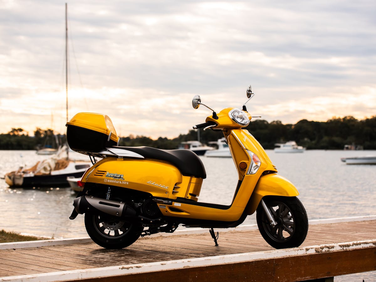 Yellow scooter on jetty in Noosa