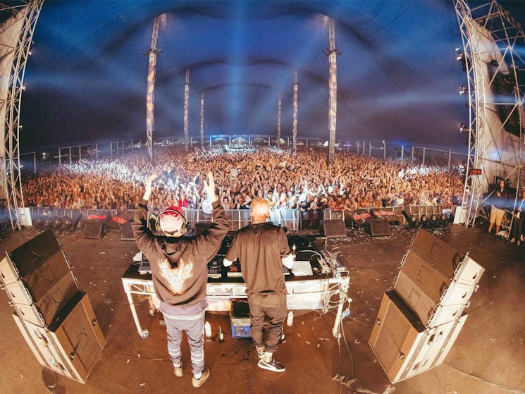 Snakehips performing in front of  huge GTM crowd in big top tent called Mooling Rouge