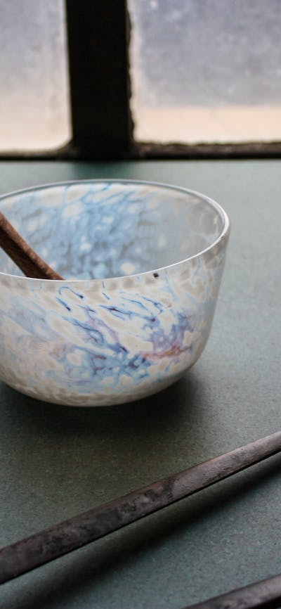 hand carved wooden spoon, and blown bowl