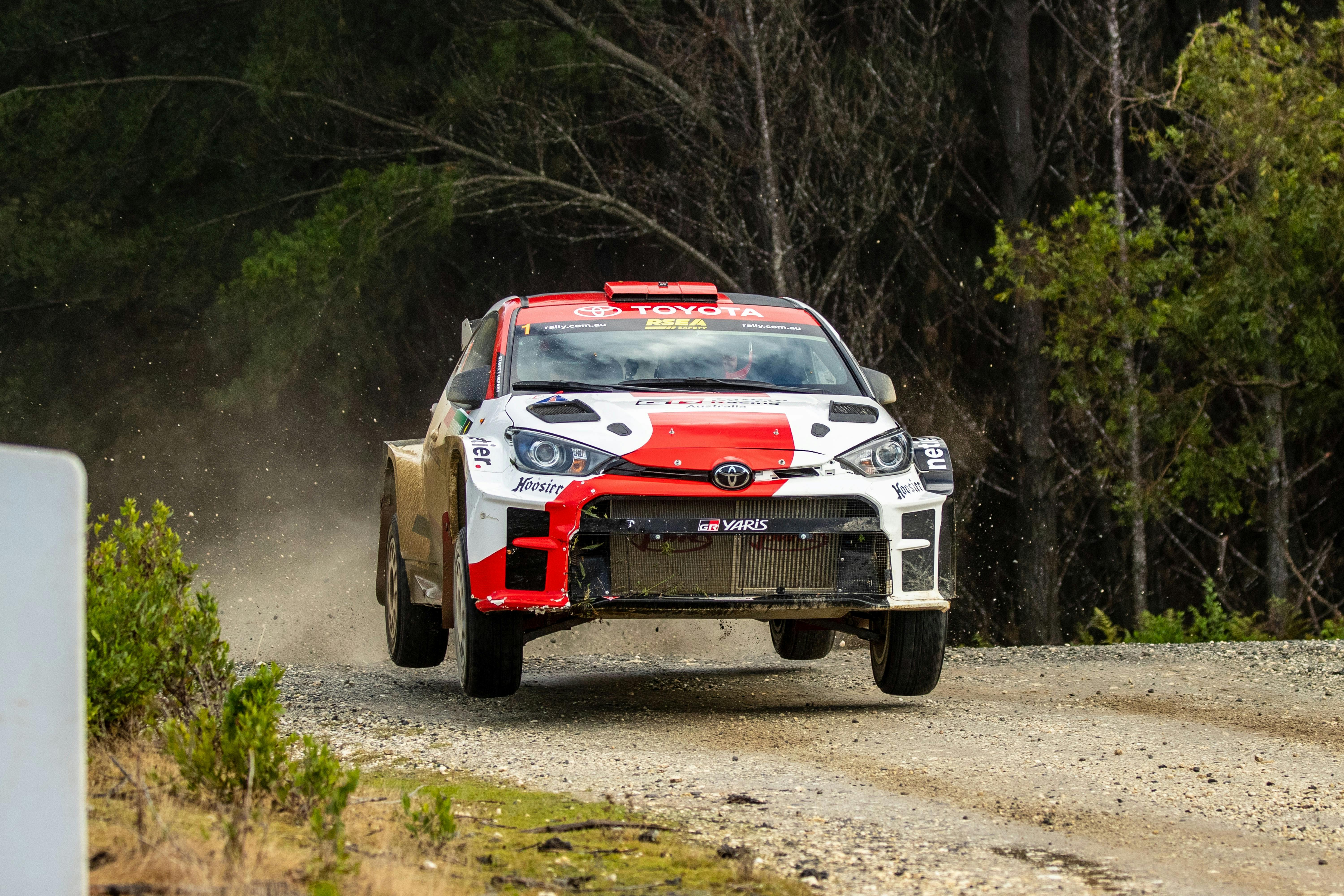 Rally car driving on the gravel
