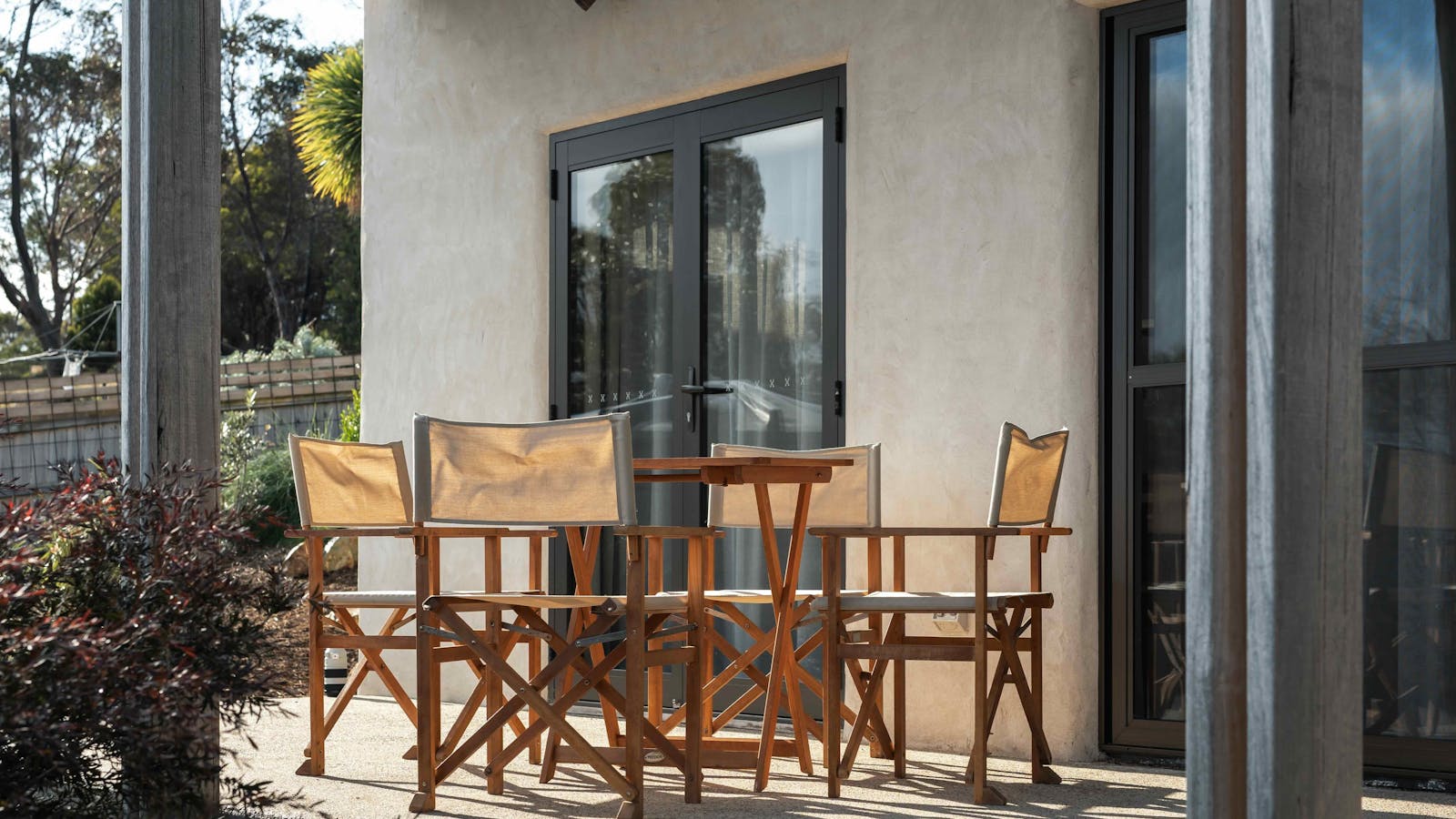 Both patio areas have a BBQ and outdoor seating.