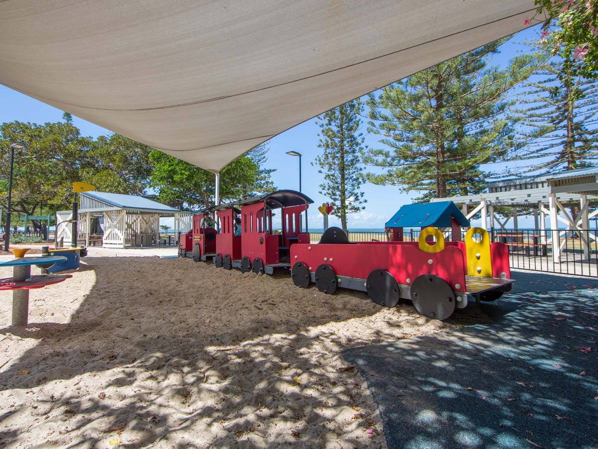 A wooden train for children to play on in Scarborough Beach Park A wooden train for children to play on in Scarborough Beach Park