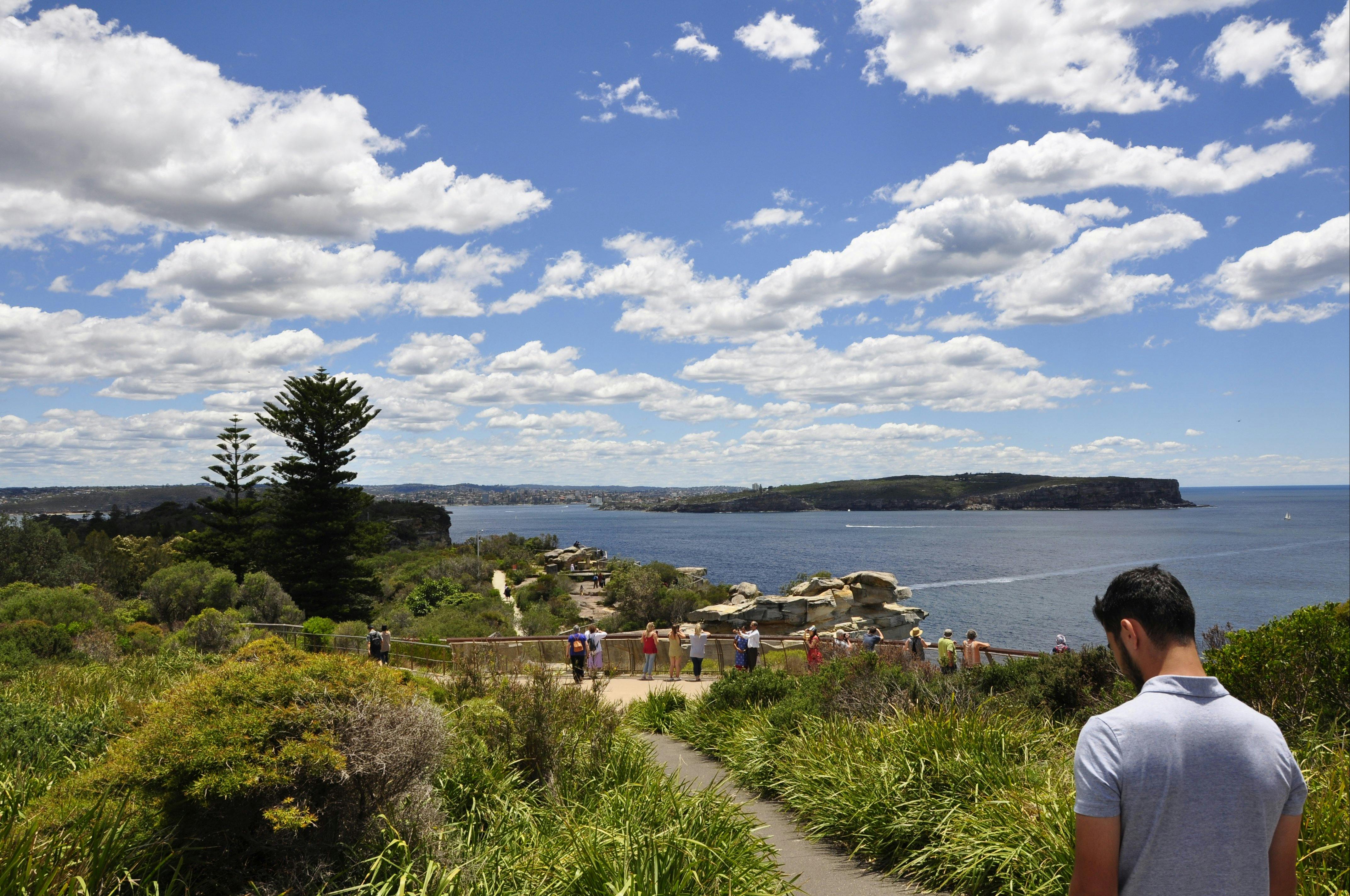 Another stop of Sydney Sightseeing tour at the Gap. Visitors are enjoying vast views of South Head.