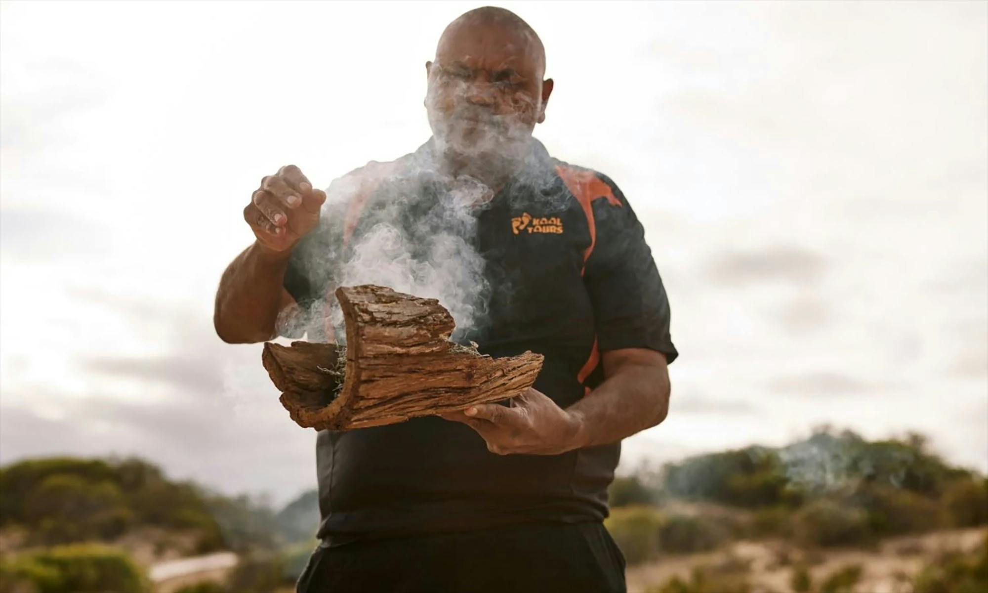 Mark doing a smoking ceremony
