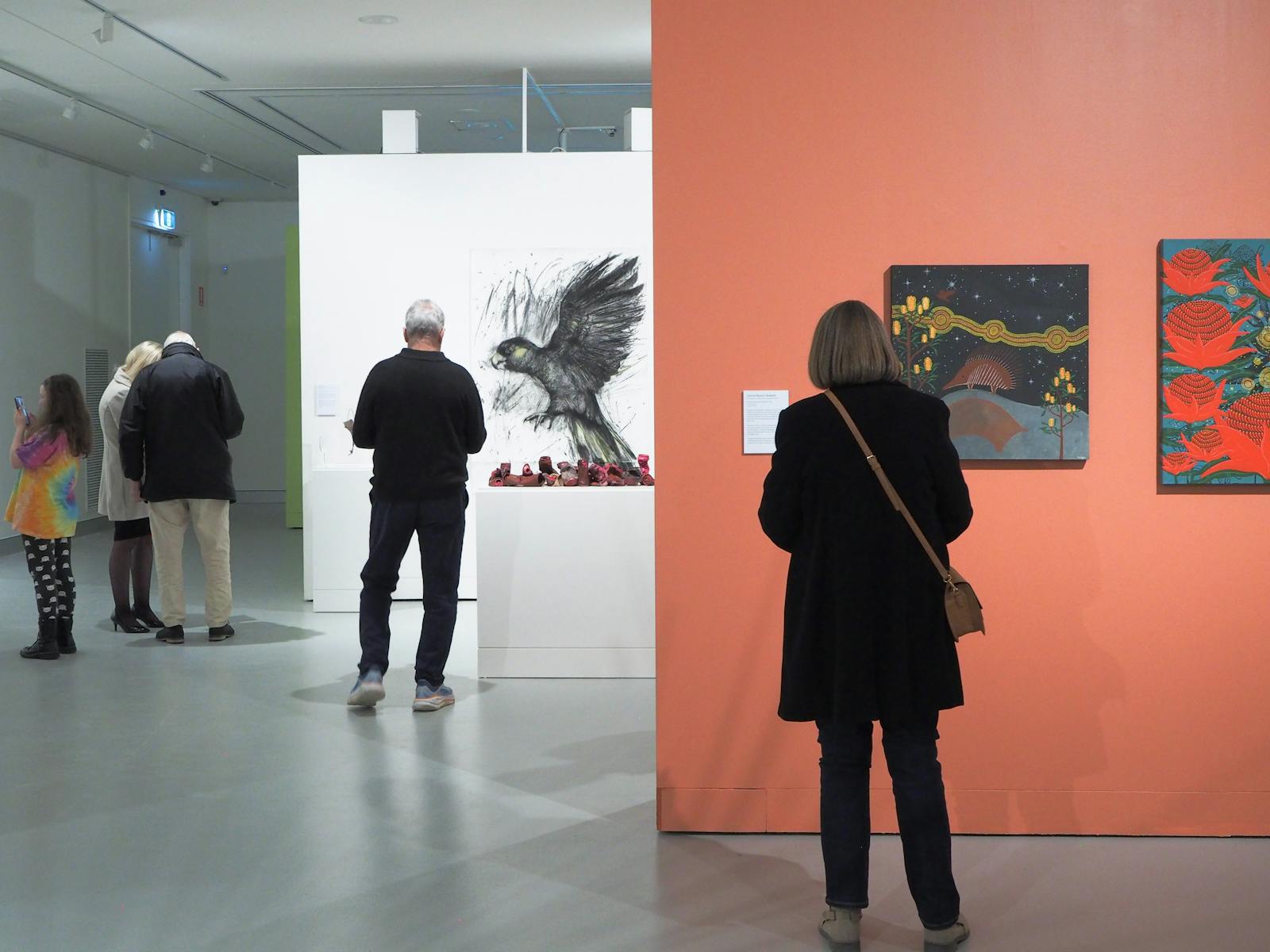 Woman viewing an artwork