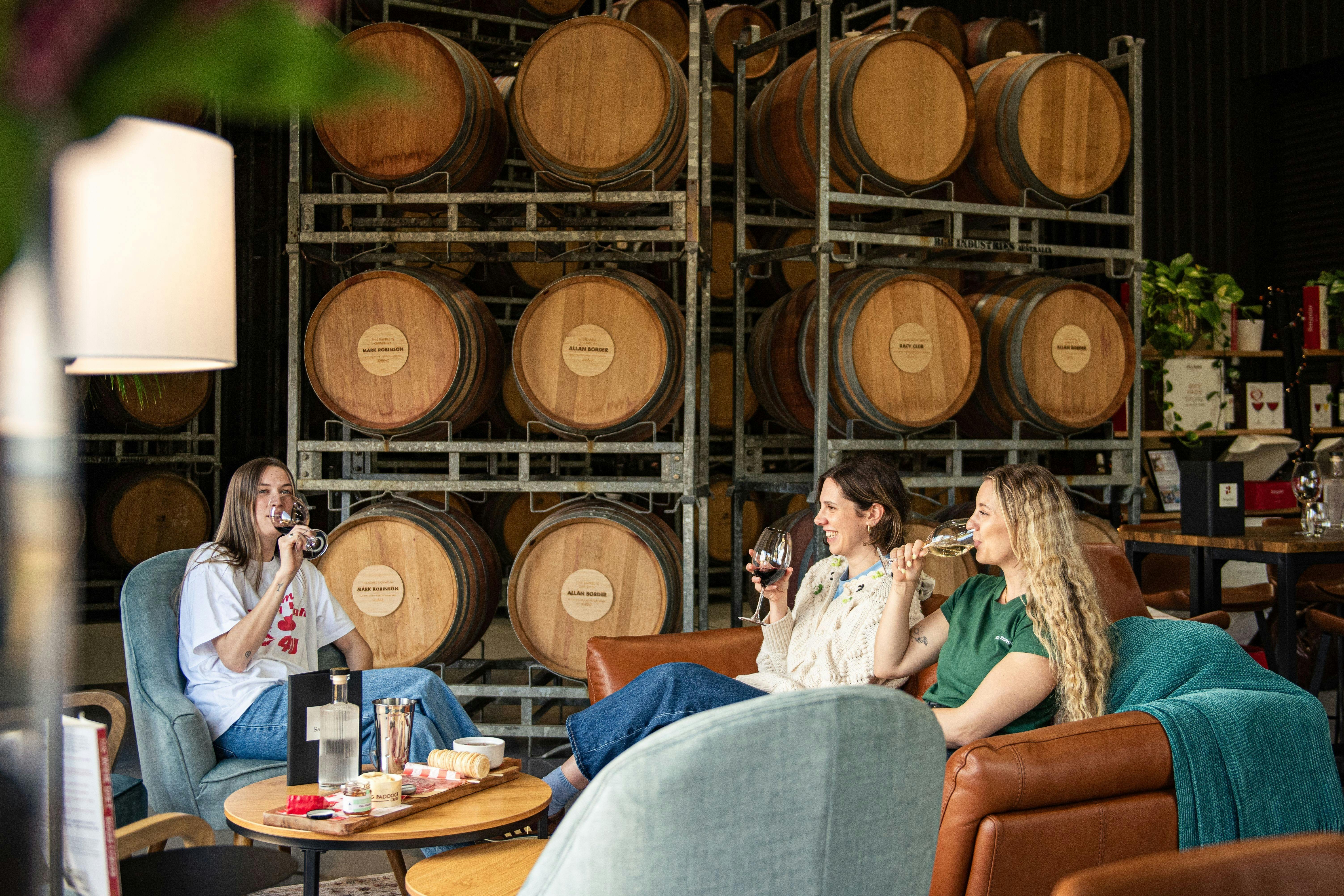 Sanguine's cellar door is located in the winery barrel room where guests are surrounded by barrels.