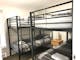 33245_discovery_parks_bright_deluxe_2_bedroom_access_cabin_sleeps_4_bunk_beds