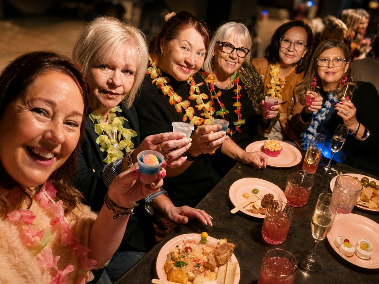 Women enjoying food, drinks and conversation at a previous Liberté Ladies Evening Out in Batemans