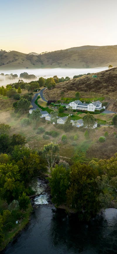 Cottages on the hill with the sun rising