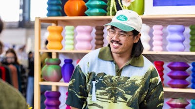 Isekai Studio smiling at a customer