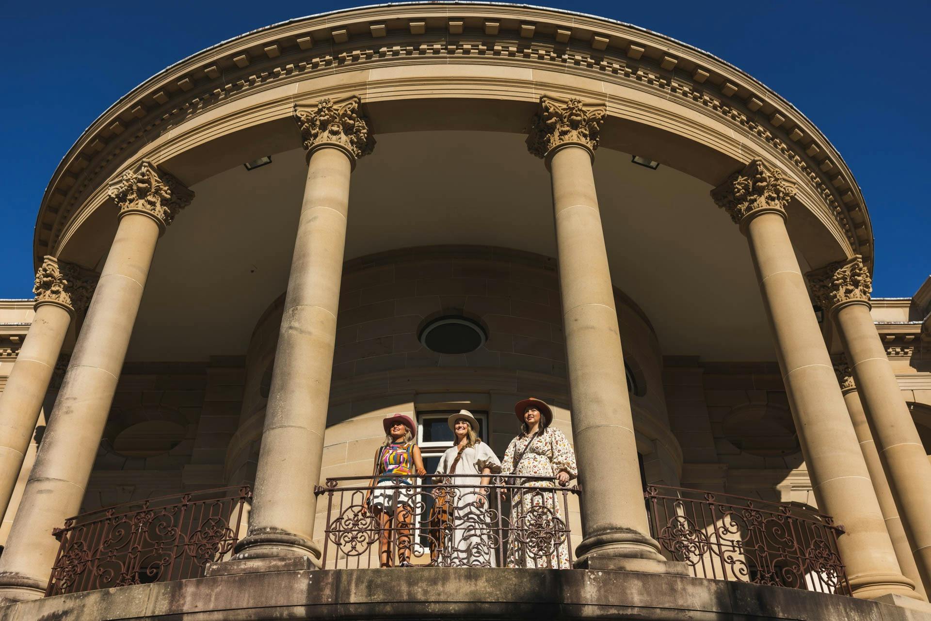 Three young girls overlook the Rockhampton River Precinct from Customs House