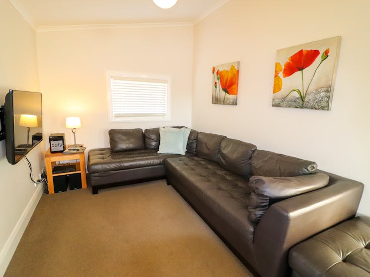 Catho cottage has a cosy living area to relax in.