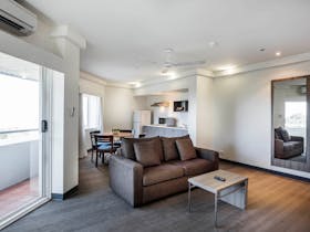 sofa, lounge area, kitchenette, balcony entrance