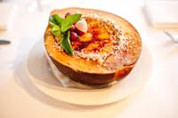 Seabean's famous crema catalana served in a half coconut