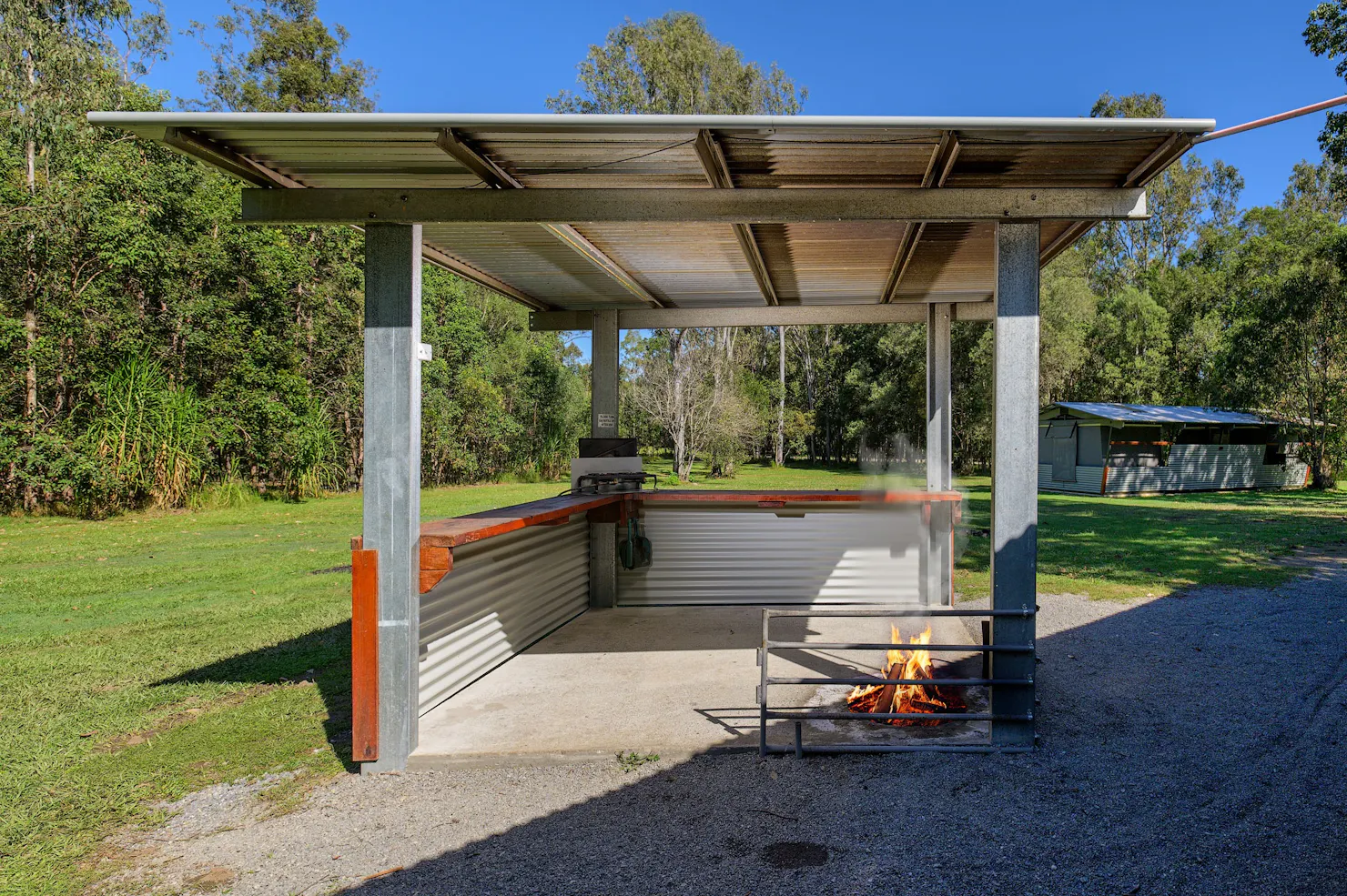 Fireplace and cooking area at each Breezeway Tent