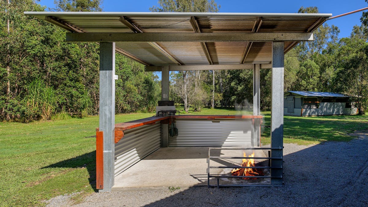 Fireplace and cooking area at each Breezeway Tent