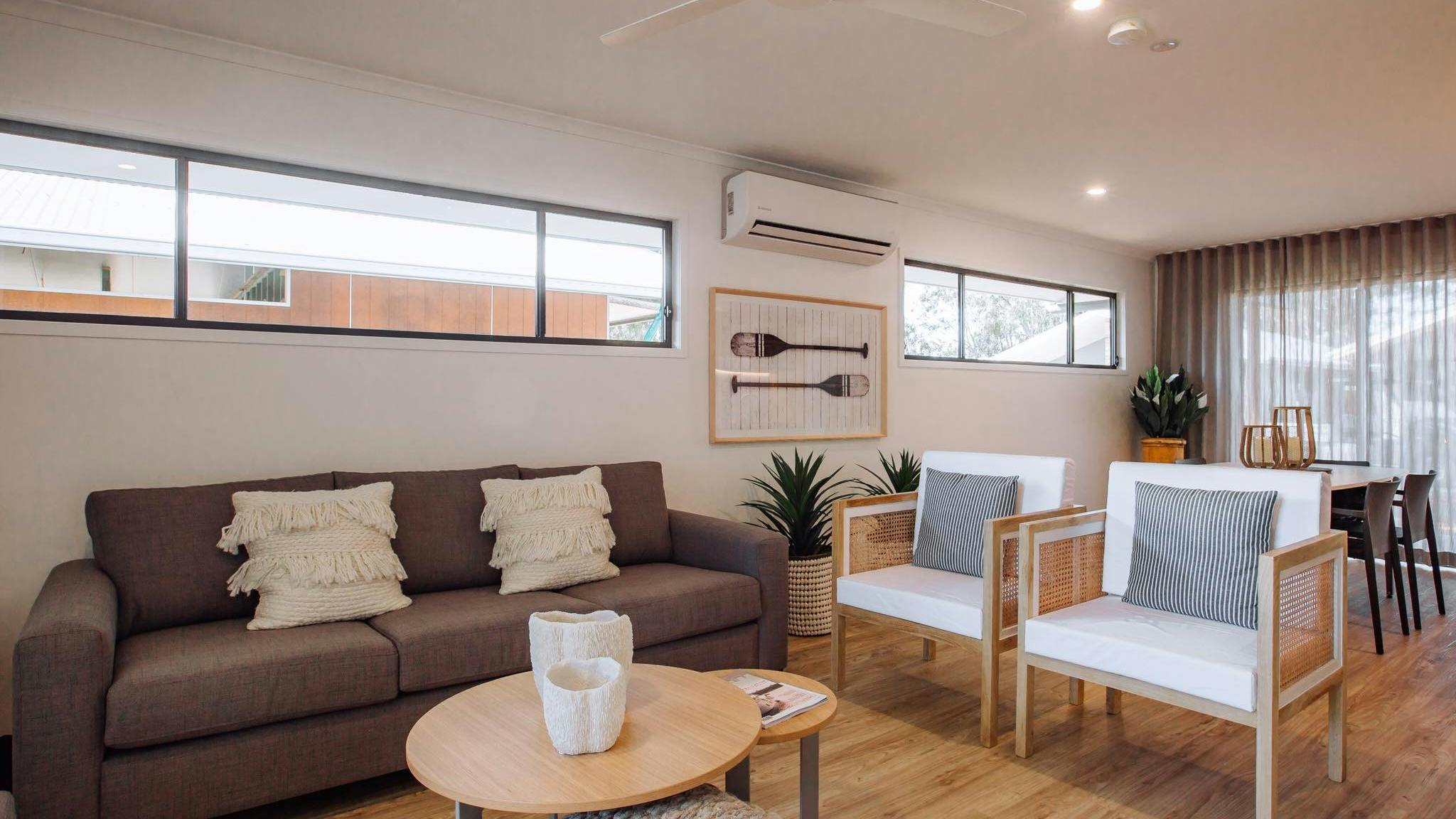 Living space with dining table, smart TV and aircon Living space with dining table, smart TV and aircon